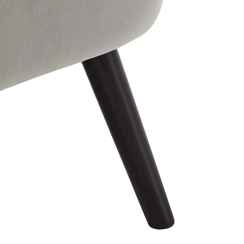 Large fauteuil capitonné