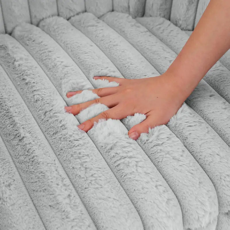 Fauteuil pivotant rond rembourré en velours côtelé