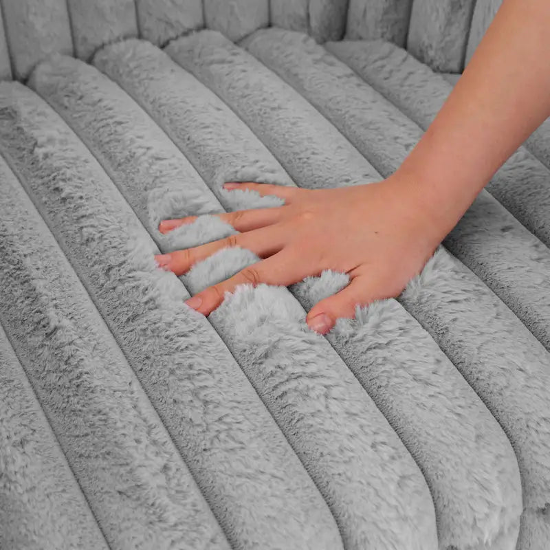 Fauteuil pivotant rond rembourré en velours côtelé